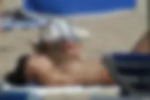 Girls on a nude beach in Sitges, Spain