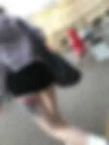 A Tall And Slim Candid Girl in Spandex Shorts in a Hoodie Top, With Tattoos on Her Long Legs Subway Creepshots