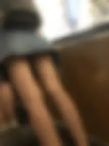Girl in a Denim Skirt Standing on a Subway Escalator Low Angle Creepshots