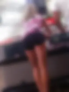 Skinny teen in spandex mini shorts at the supermarket