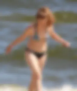 Two sexy beach teens in bikinis, one thick and one skinny with big boobs