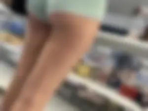 White chick with cheeks hanging out of green shorts