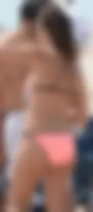 Girl in peach bikini on the beach with a great body and great ass