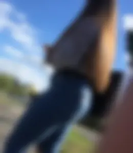 Long haired beauty teen with a tight ass in jeans