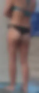 Beach shower milf in semi thong bikini with a nice ass