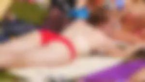 Sexy Girl in Underwear Lying on a Blanket in the Park Creepshot