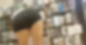 Girls in tight shorts in a shop