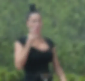 Brunette showing massive cleavage with big ass tits