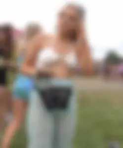Hot candid festival blonde in see through pants and braless with pierced tits