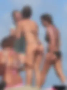 Sexy beach lady in tiny brown thong bikini with a nice ass