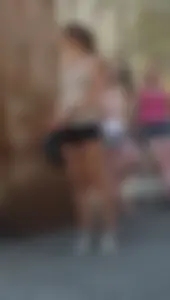 Girl in Mini Shorts with Long Legs on the Street Creepshot