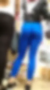 Hot ass brunette babe with an incredible booty in tight blue leggings