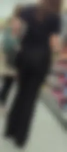 Brunette babe in black flares