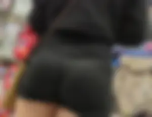 Blonde girl in black shorts