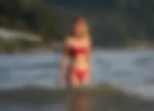 Skinny blonde babe in red bikini with camel toe and little pokies