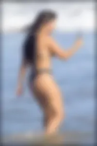 Two sexy ass friends at the beach in thong bikinis