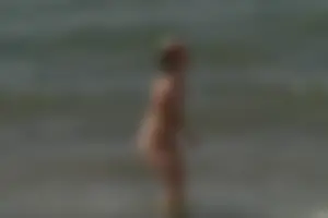 Girls on a nude beach in Sitges, Spain