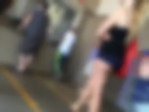 Hot muscly legs and booty in mini shorts, candid girl at the subway station