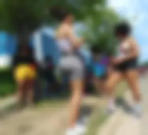 Hot ass candid Morena carnival goer with an incredible bubble butt in grey spandex shorts (part 1)
