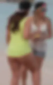 Couple PAWGs on the beach in bikinis partying