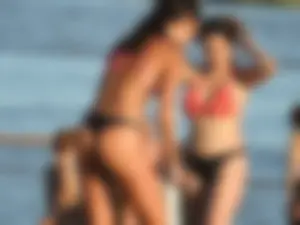 Fit girl with nice body in thong bikini on the beach