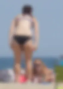 3 girls on the beach in bikinis with big boobs, one brunette and two blondes