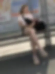Bus Stop Girl Sitting with Crossed Legs Street Candid Photos