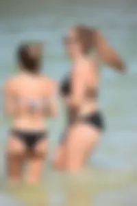Sexy group of girls on the beach in various sizes