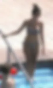 Sexy pool teen with big boobs barely staying in her top