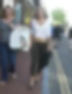 Sexy blonde out walking in green leggings with vpl
