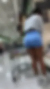 Latina Lady Lumps in blue spandex shorts