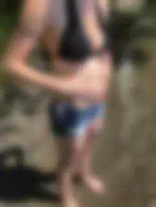 Someones girlfriend with nice tits in black bikini top and shorts