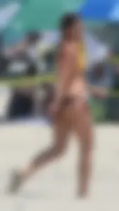 Bunch of sexy babes at the beach in bikinis