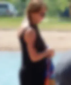 Lady with nice tits in a white bikini on the beach