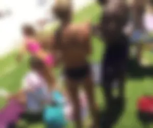 Hot Girl in Swimsuit On the Lawn in a Park Candid Photos