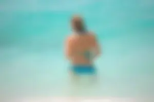 Assortment of sexy babes at the beach in bikinis