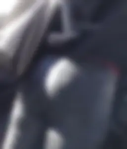 Milf shows off her shapely ass in her leather pants at the market