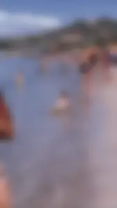Chubby redhead walking on the beach gif