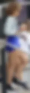 Mixed race woman in spandex shorts outfit