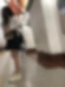 Girl in a Blouse And a Skirt With Great Legs Creepshots Gallery - Standing on the Subway Station, then Sitting With Crossed Legs in a Train