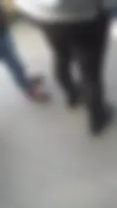 Girl wearing a black skirt over her leggings
