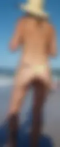 Cute girl on the beach with a decent body in thong bikini