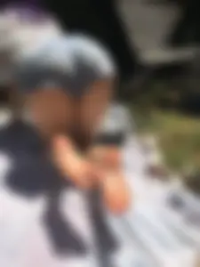 Girl Standing on Knees Doggy Style in Mini Shorts in the Backyard