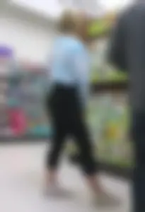 Blonde girl in leggings shopping