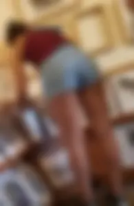 Laughing girl in shorts, legs and thick peach