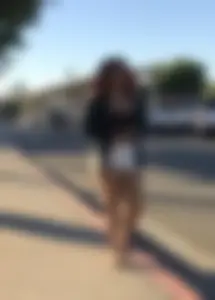 Big boobed redhead walking with no shoes and in shorts