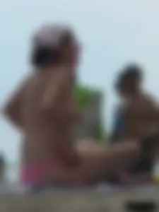 Sexy candid topless and nude beach girls