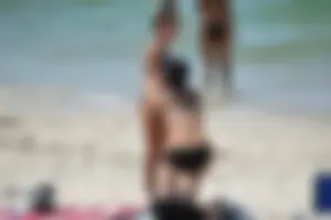 Sexy ass girl with a perfect body in her bikini on the beach