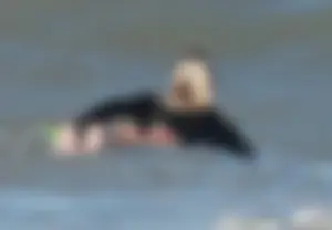 Hot surfer chicks out in the water
