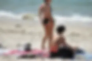 Sexy ass girl with a perfect body in her bikini on the beach